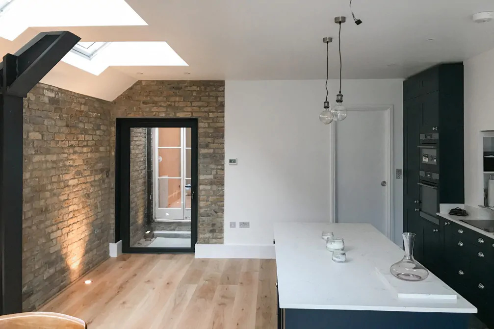 Interior walls and woodwork finished to a lettable standard
