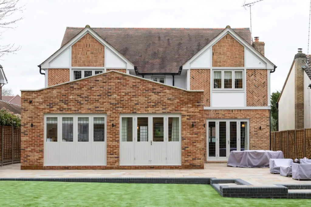 Freshly painted doors and windows on a brick house in Surrey