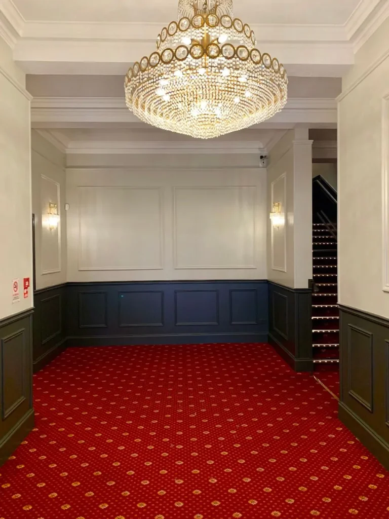 Hallway with chandelier