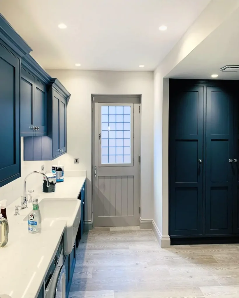 Kitchen with dark blue cabinets
